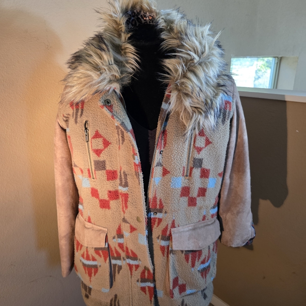 Tasha Polizzi Native jacket With Fur Collar.